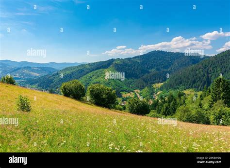 Fields And Meadows Of Rural Landscape In Summer Idyllic Mountain