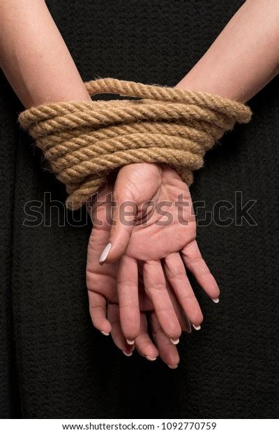 Womans Hands On Back Tied Rope Stock Photo Shutterstock