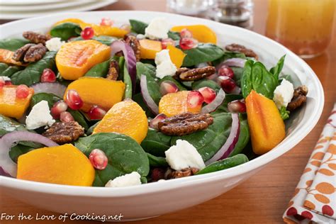 Spinach Salad With Persimmons Pomegranate Seeds And Candied Pecans