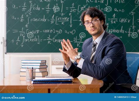 The Young Male Math Teacher In Classroom Stock Image Image Of Academic Educational 140025413