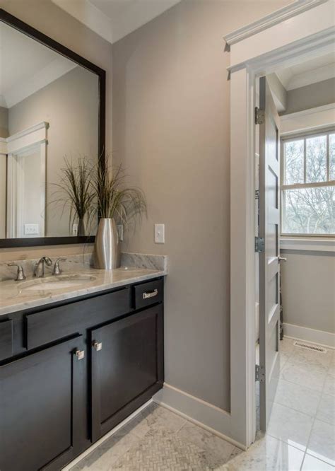 Sherwin williams eider white sw 7014. transitional bathroom with Sherwin-Williams colonnade gray ...