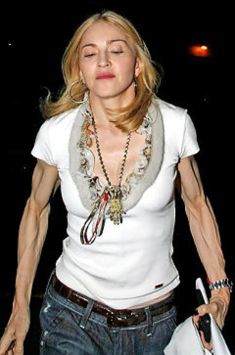 madonna proudly shows off her stringy muscular arms in london ny daily news