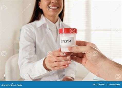 Donor Giving Container Of Sperm To Doctor In Hospital Stock Image Image Of Diagnostic