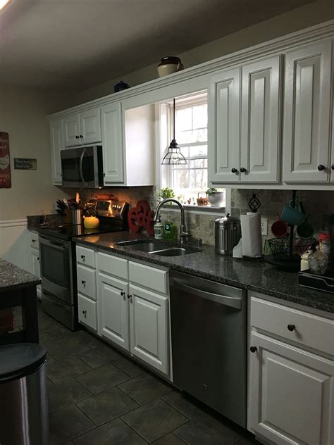 A kitchen cabinet makeover paper moon's austin team expertly assessed the kitchen makeover and took a long look at the client's goals. Kitchen makeover. Golden oak to white cabinets. | Kitchen remodel, White kitchen makeover ...