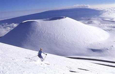Woman Skiing On Mauna Kea The Big Island Hawaii © Stock Connection