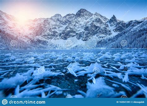 Ice Flakes On Scenic Frozen Mountain Lake Stock Image Image Of Alps