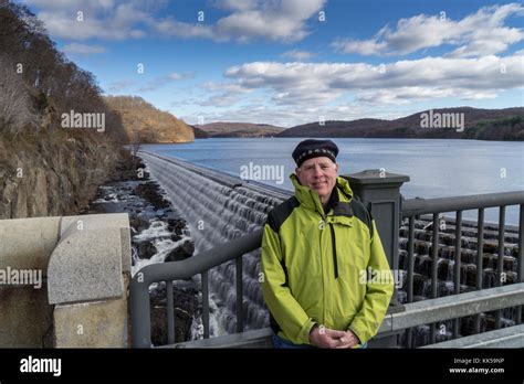 Man Standing On The Walkway Next To The New Croton Dam In Croton On