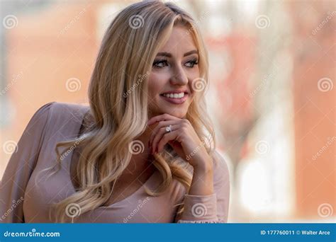 A Lovely Blonde Model Enjoys An Autumn Day Outdoors In A Small Town Stock Image Image Of Body