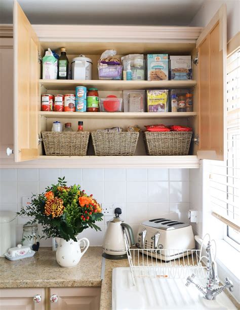 How To Organize Your Kitchen Cabinets Create Space Dainty Dress Diaries