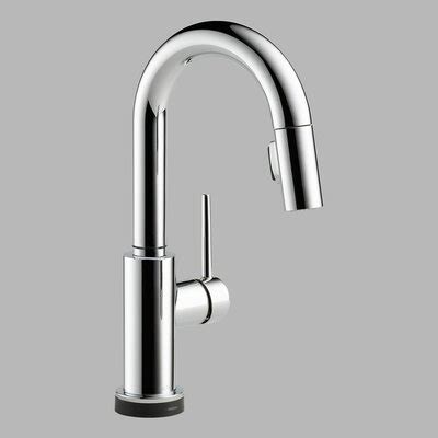 This modern kitchen faucet by delta® provides a practical and hardworking solution that will stand the test of time. Delta Trinsic Pullout Spray Touch Bar / Prep Faucet with ...