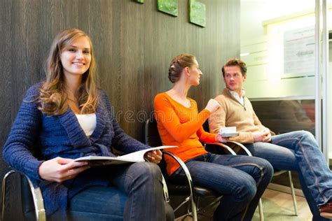 Patients In The Waiting Room Of A Doctors Office Stock Image Image Of Medical Care