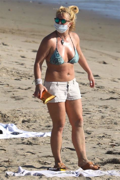 Britney Spears Sunbathing On The Beach In Malibu With Her Security Guard Photos The