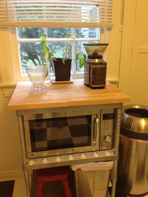 There is our keurig looking for a new coffee brewer so leave your suggestions below! & our french press from marshalls which we typical use to make coffee. Microwave stand/coffee station. Retro redo, vintage ...