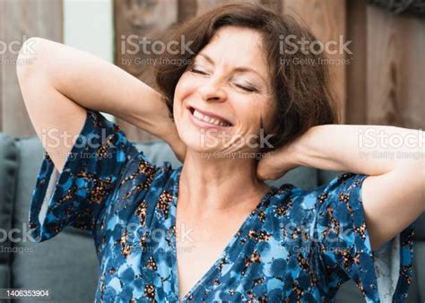 Very Happy Mature Woman Laughing Closing Her Eyes Raising Her Hands