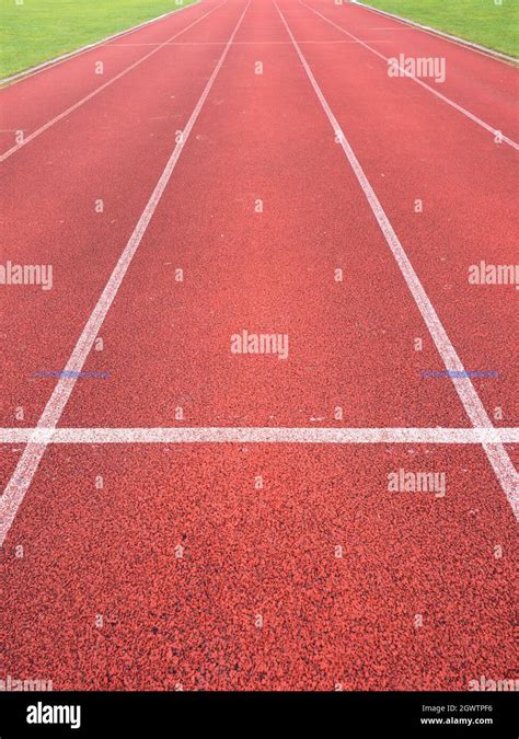 White Lines And Texture Of Running Racetrack Red Rubber Racetrack