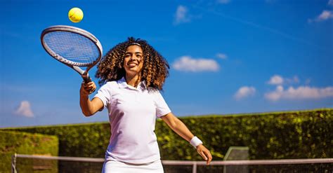 A Beautiful Black Female Tennis Player On The Court Stock Photo