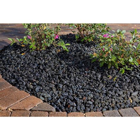Black lava rock can be used to accent your garden or planters. Pavestone 0.5 cu. ft. Black Volcanic Rock (64 Bags / 32 cu ...