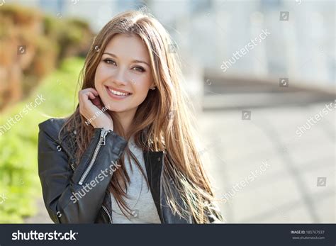 Portrait Of Young Smiling Beautiful Woman Stock Photo