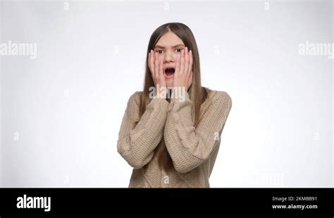 Shocked Or Surprised Girl Opens Mouth And Closes It With Hands Stock Video Footage Alamy