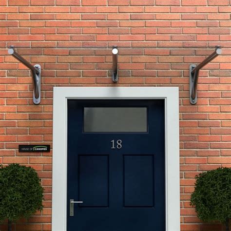 This set up works great for shade, privacy, and keeping the rain flowing. Glass Door Canopy With Gallows Brackets TYPE K With Grey ...