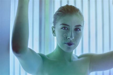 beautiful woman making uv ray treatment in the solarium stock image image of health