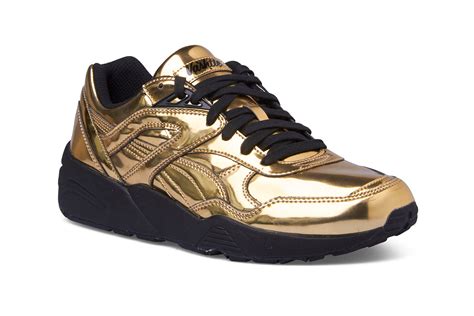 Puma shoes can make any man or woman look on top of their fashion game with a smart and sporty look. Gold R698 Puma x Vashtie Sneakers | WOMEN | ShoeChapter.com