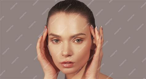 Premium Photo Smooth Skin Facelift Woman Touching Soft Face