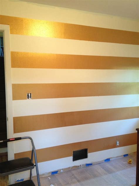 Pin by brittany kennedy on bedroom ideas | cuarto de chicas. Gold stripe wall in nursery. | All things Charlie ...