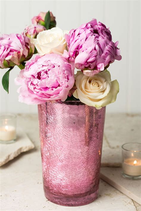 Last minute i decided to run over to the dollar store real quick and dig through what i already have to see what i can glue together. Pink Crackled Glass 8in Vase | Pink glass vase, Pink vase ...