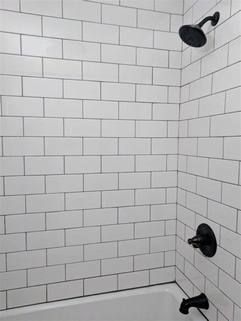 White Subway Tile With Gray Grout Bathroom