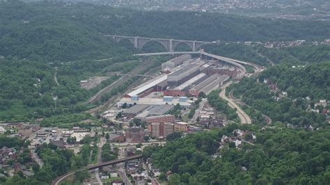 5k Stock Footage Aerial Video Approaching A Large Factory Turtle Creek