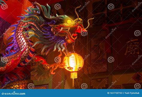 Chinese New Year Dragon Decoration On Chinese Temple With Lights At
