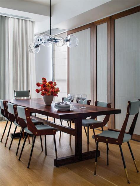 Midcentury Modern Dining Room With Globe Pendant Light