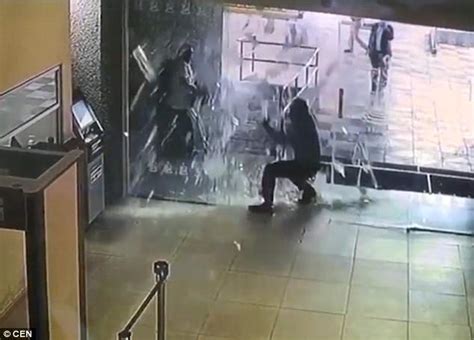 Shocking Moment Worker Runs Smack Bang Into A Glass Door In Mexico Daily Mail Online