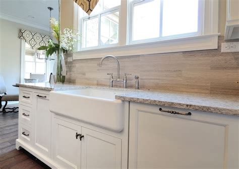 Natural and simple, rustic kitchen backsplash ideas can show you the enduring benefits of presenting what natural materials have in store. Country Kitchen with Apron front sink, Porcelain wood look ...