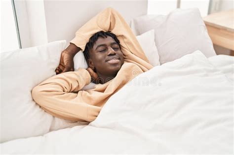 African American Man Lying On Bed Sleeping At Bedroom Stock Image Image Of Lying Black