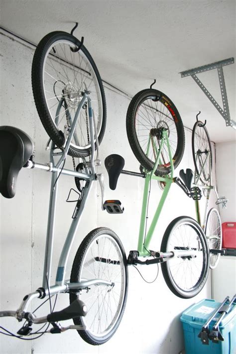 It saves on space by stacking two bikes vertically on top of each other. Hang bikes in the garage - Check! | Garage organization ...