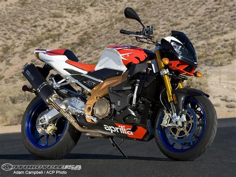 It's red wheels and magnificent tail. 2007 Aprilia Tuono Factory Comparo Photos - Motorcycle USA