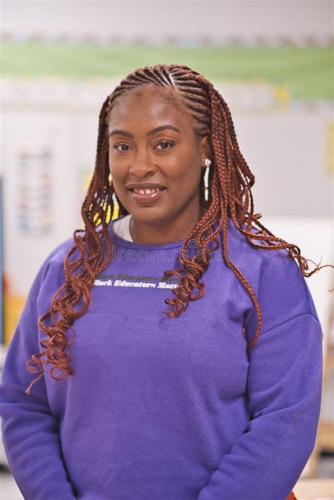 Portrait Of A Smiling Confident African American Female Teacher In The