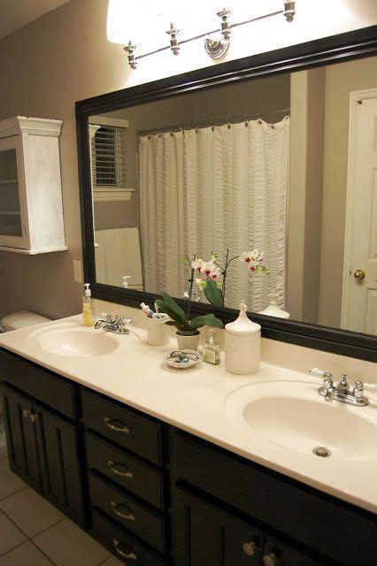 How can i glue a bathroom mirror back into it's frame? DIY mirror frame | Bathroom mirrors diy, Diy mirror frame ...