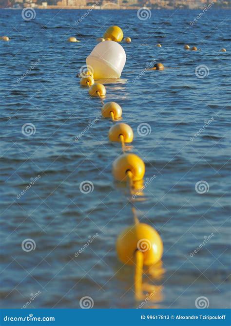 Multiple Buoys In The Water Stock Image Image Of Buoys Beach 99617813