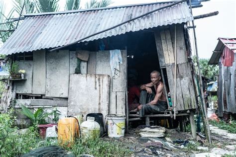 Man In Shanty House Photo With Essay By Tetsu Ozawa Shanty Town