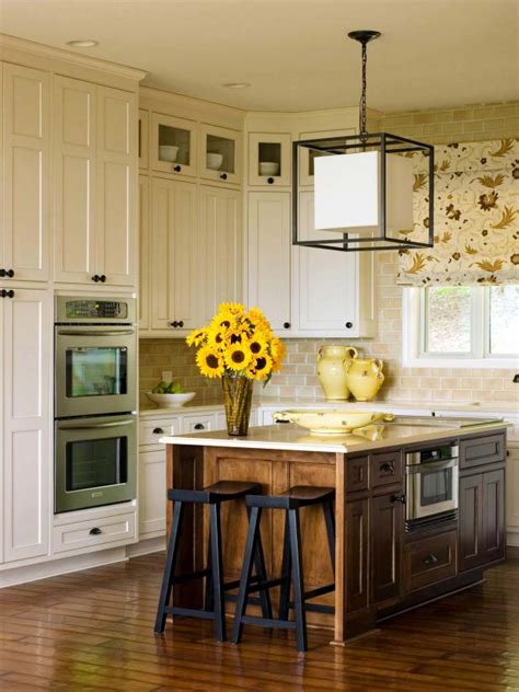 Refinishing cabinets is different from refacing because the existing cabinet doors and drawers are used. Kitchen Cabinets: Should You Replace or Reface? | HGTV