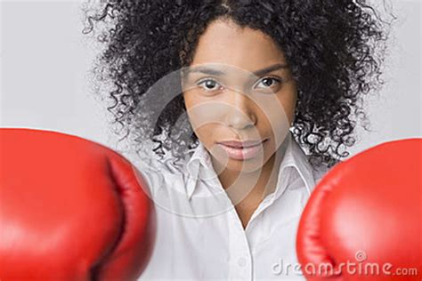 Determined African American Girl With Boxing Gloves Stock