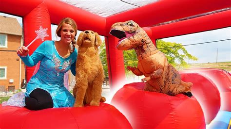 Frozen Elsa Surprises Sammie With Wipeout Bounce House Youtube