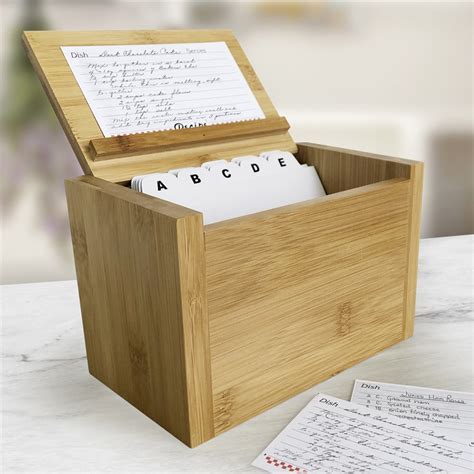 These kitchen gadgets and accessories are both practical and for the sentimental chef, check out the personalized aprons or cutting boards. Engraved Kitchen Utensils Recipe Box | GiftsForYouNow