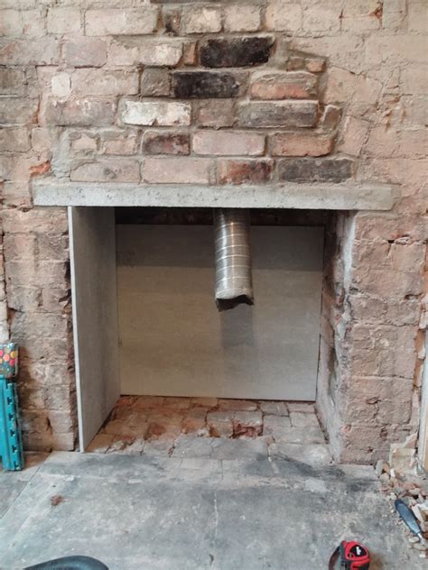 Paint the backboard surrounding your fireplace black to mimic an old fireplace cavity, and select a slim black. Getting the Chimney Log Burner Ready! | Kezzabeth.co.uk ...