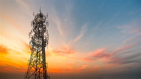 5g Sunset Cell Tower Cellular Communications Tower For Mobile Phone And