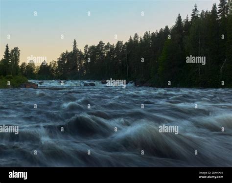 Kengis Rapids On Torne River In Northern Sweden Near Border With