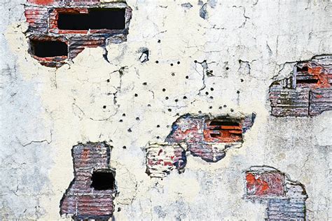 Bullet Holes Wall Pictures Images And Stock Photos Istock